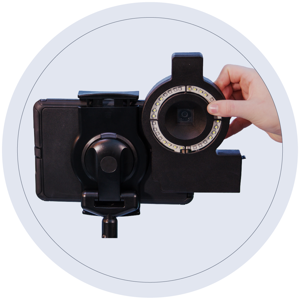 iPad attached to a tripod with the Optisolve Pathfinder attached