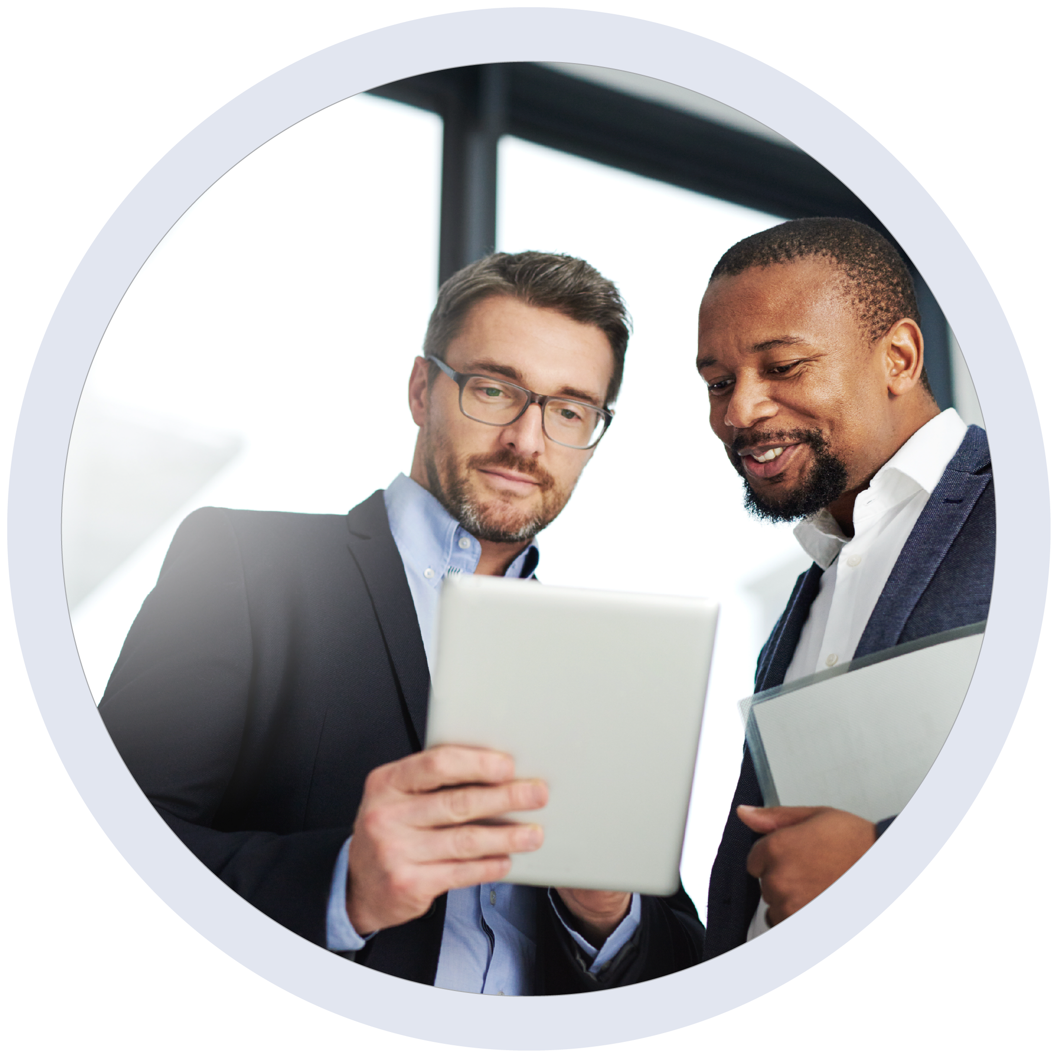 to men looking at SAVI on a tablet